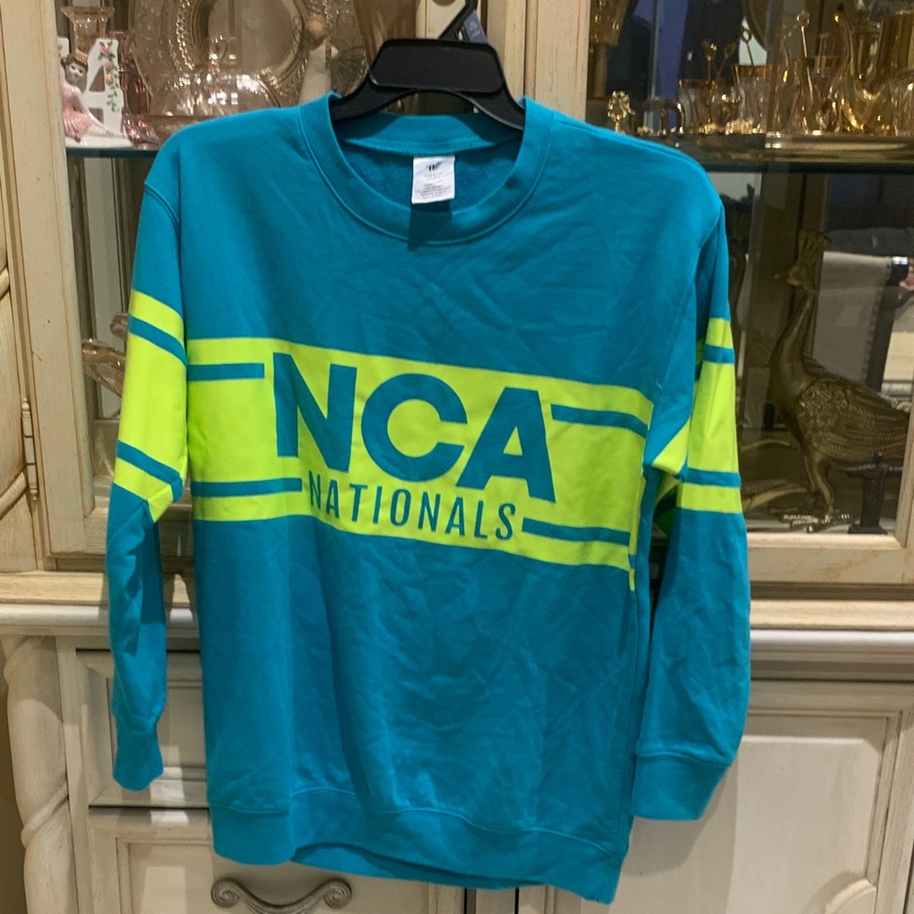 NCA Women’s Blue and Yellow Sweater size SM in great condition